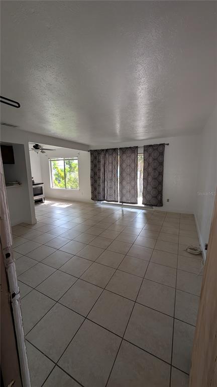 4028 Billingsgate Road Orlando, FL 32839 - Photo 3 of 8 a view of an empty room and window