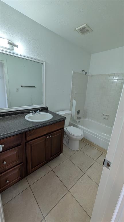 4028 Billingsgate Road Orlando, FL 32839 - Photo 7 of 8 a bathroom with a sink a toilet and shower
