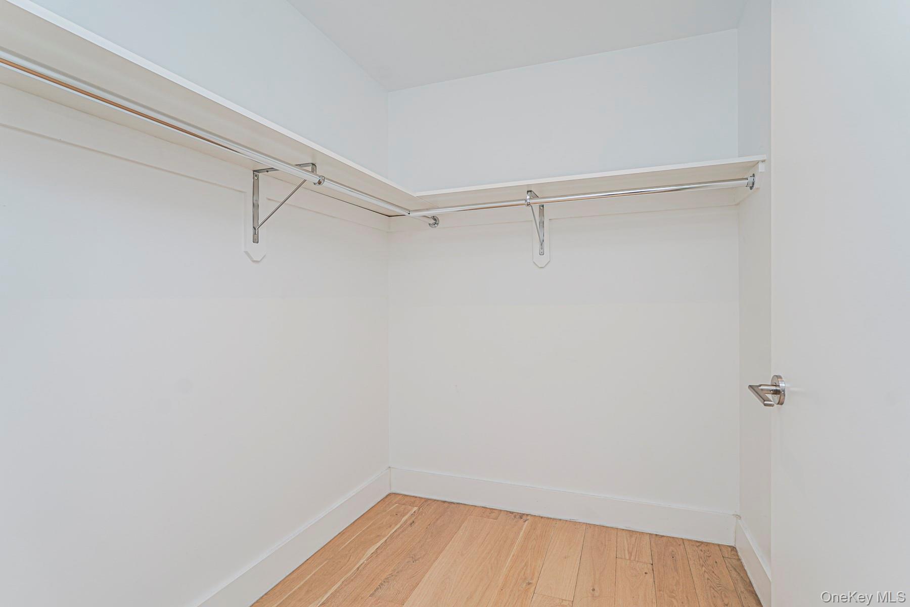 133 Beach 116th Street, Unit 2C Queens, NY 11694 - Photo 26 of 35 a view of a room with racks on the wall