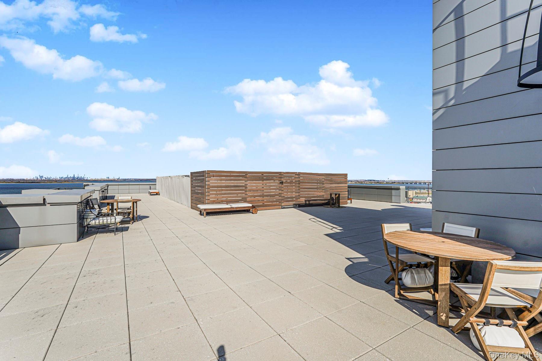 133 Beach 116th Street, Unit 2C Queens, NY 11694 - Photo 30 of 35 a view of terrace with seating space