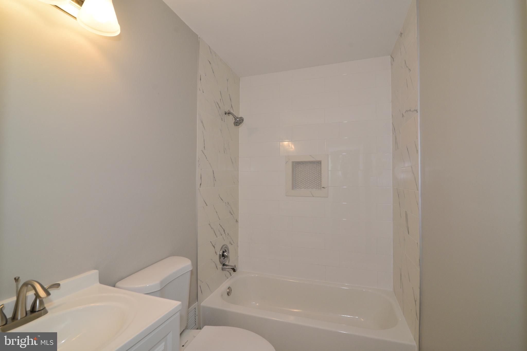 11803 Coopers Court Reston, VA 20191 - Photo 23 of 38 REMODELED HALL BATH