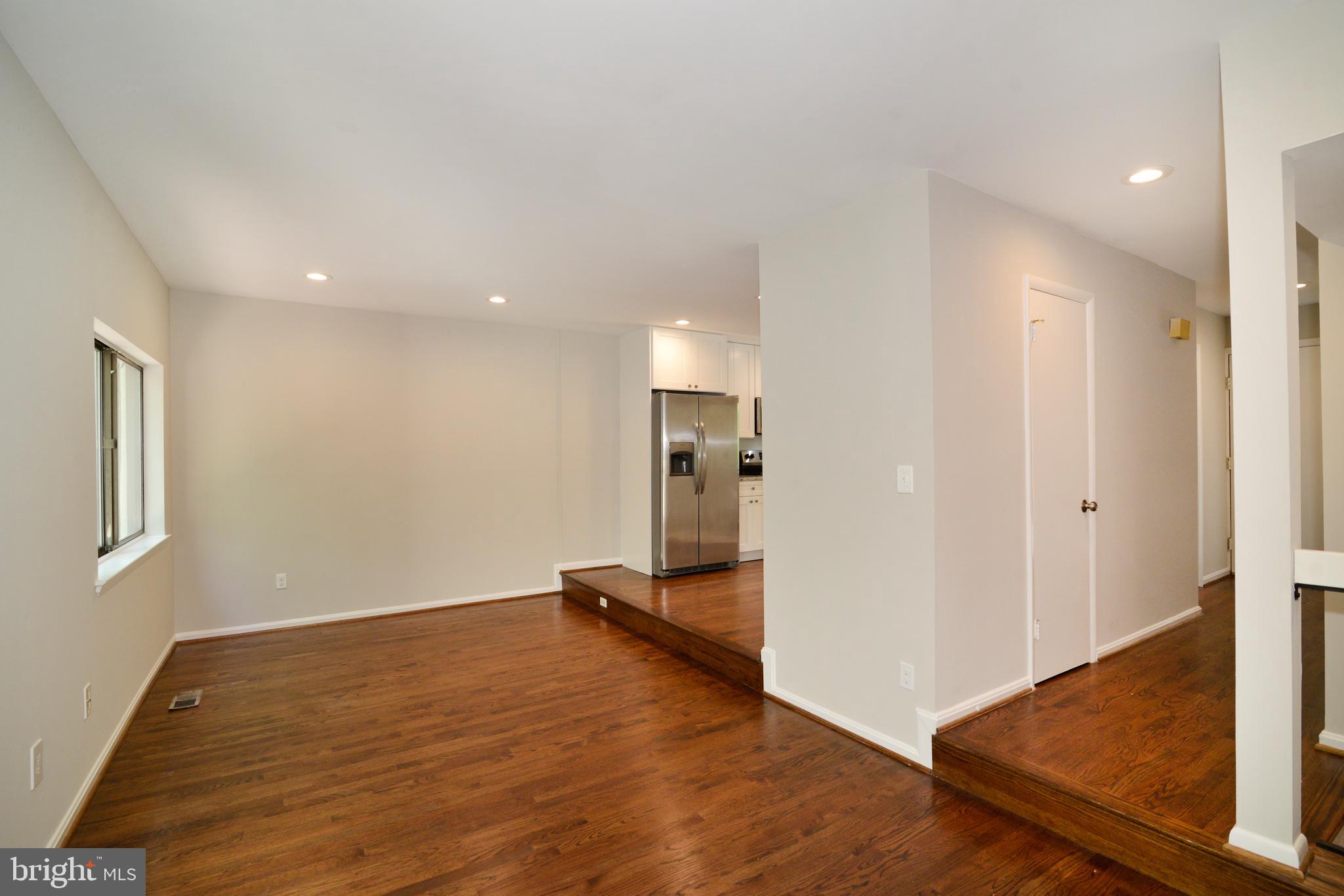11803 Coopers Court Reston, VA 20191 - Photo 7 of 38 HARDWOOD FLOORING IN FAMILY ROOM