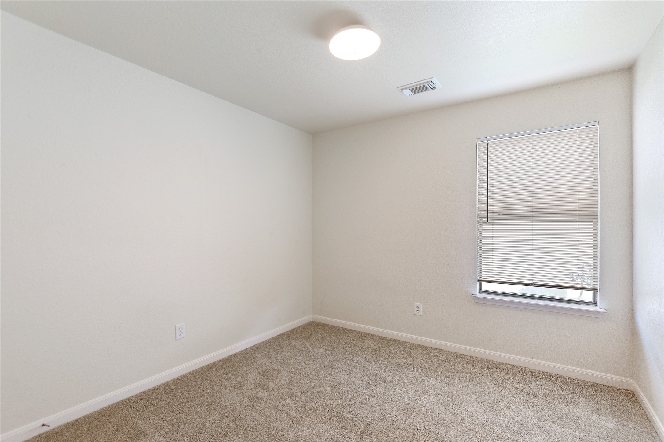 29522 Legends Stone Drive Spring, TX 77386 - Photo 10 of 17 an empty room with a window