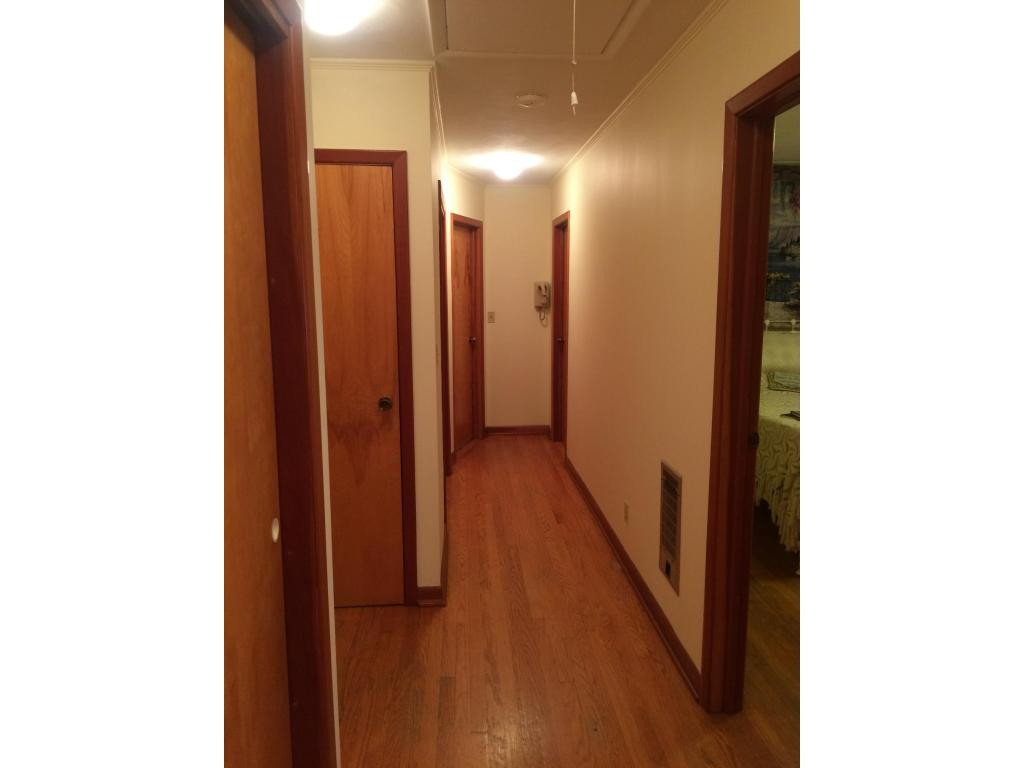 704 East Barton Ridge Road Greeneville, TN 37745 - Photo 12 of 24 Hallway with Hardwood Floors