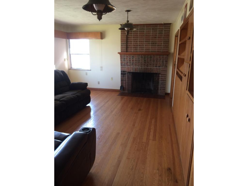704 East Barton Ridge Road Greeneville, TN 37745 - Photo 10 of 24 Den with Fireplace