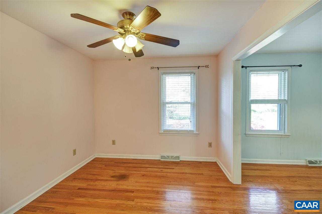 2974 Courthouse Road Louisa, VA 23093 - Photo 20 of 49 a view of an empty room with wooden floor and a window