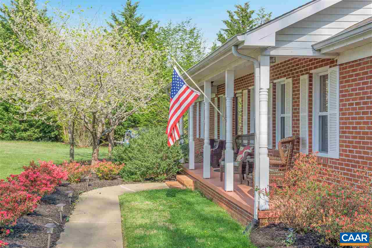 2974 Courthouse Road Louisa, VA 23093 - Photo 3 of 49 a front view of a house with garden