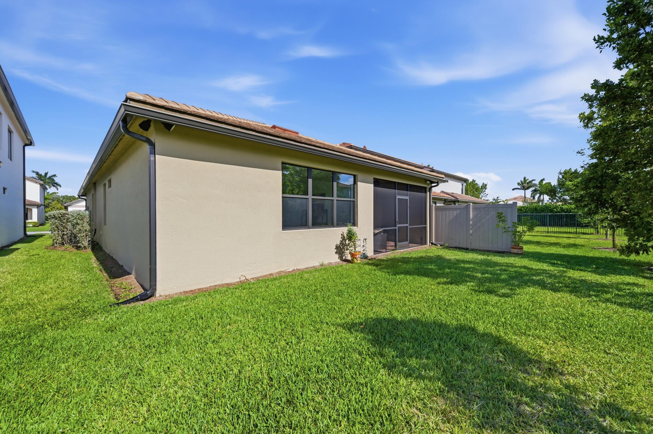 4763 Roldan Court Lake Worth, FL 33467 - Photo 35 of 49 Rear of the home