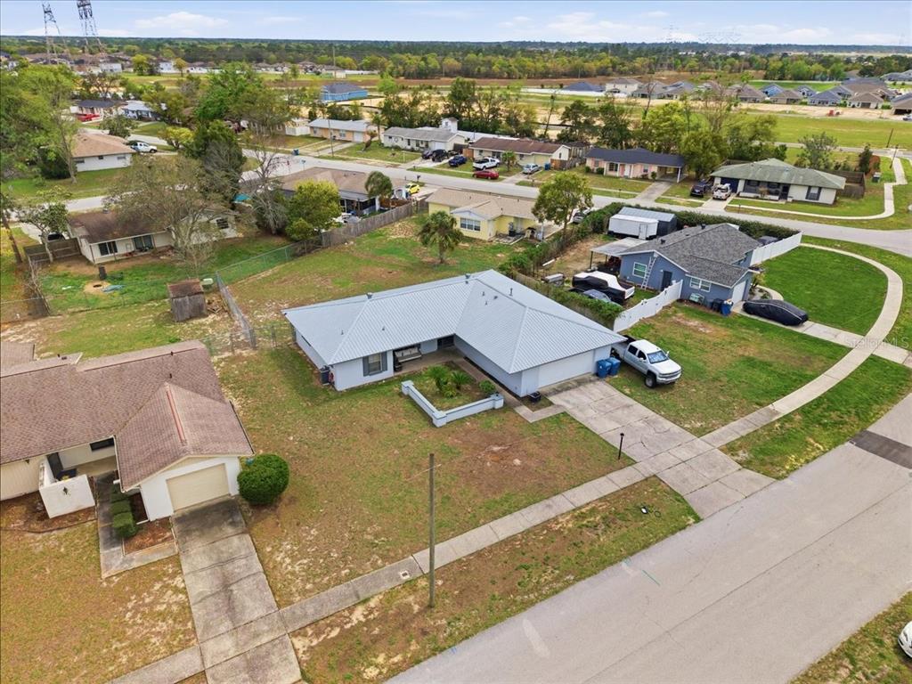 4464 Bromley Avenue Spring Hill, FL 34609 - Photo 42 of 43 an aerial view of residential houses with outdoor space