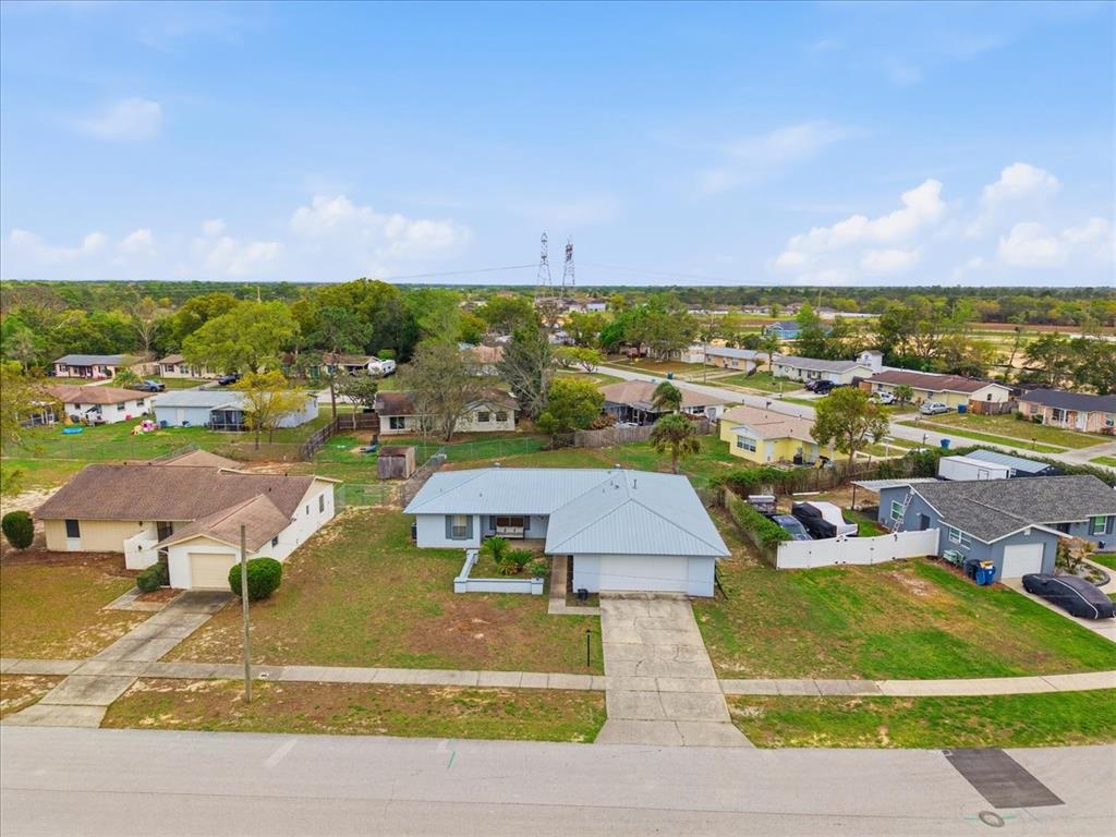 4464 Bromley Avenue Spring Hill, FL 34609 - Photo 5 of 43 an aerial view of a houses with outdoor space