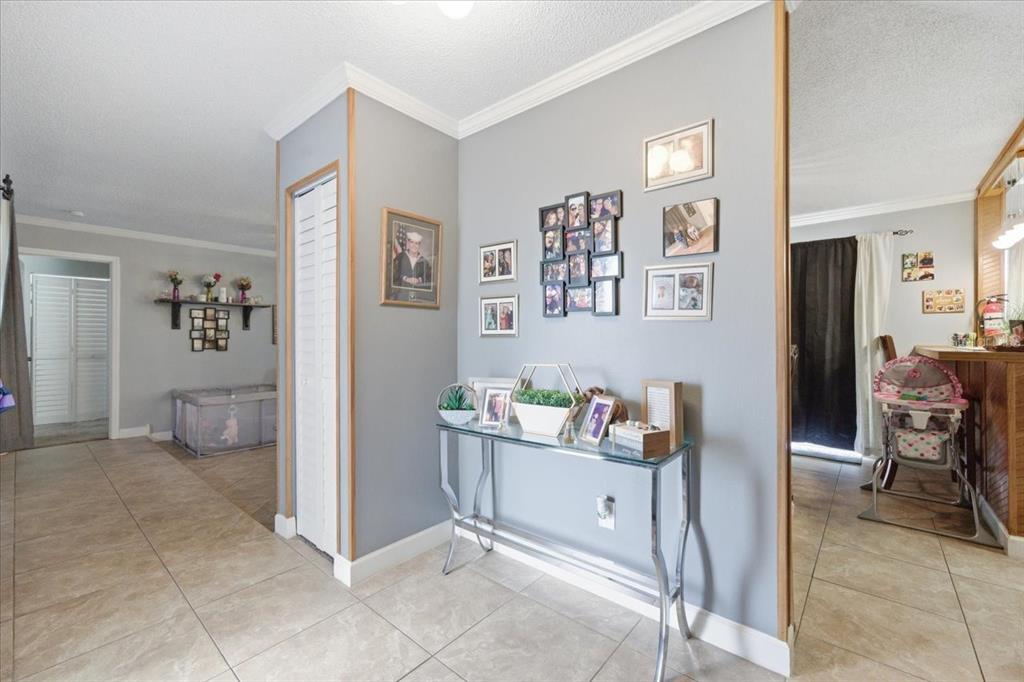 4464 Bromley Avenue Spring Hill, FL 34609 - Photo 9 of 43 a living room with furniture and wooden floor
