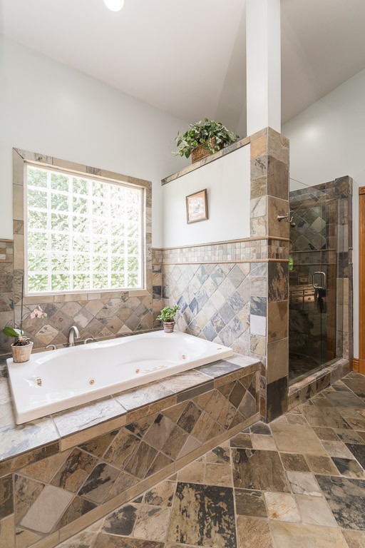 4134 Wells Road Springfield, TN 37172 - Photo 22 of 44 a bathroom with a bathtub and a shower