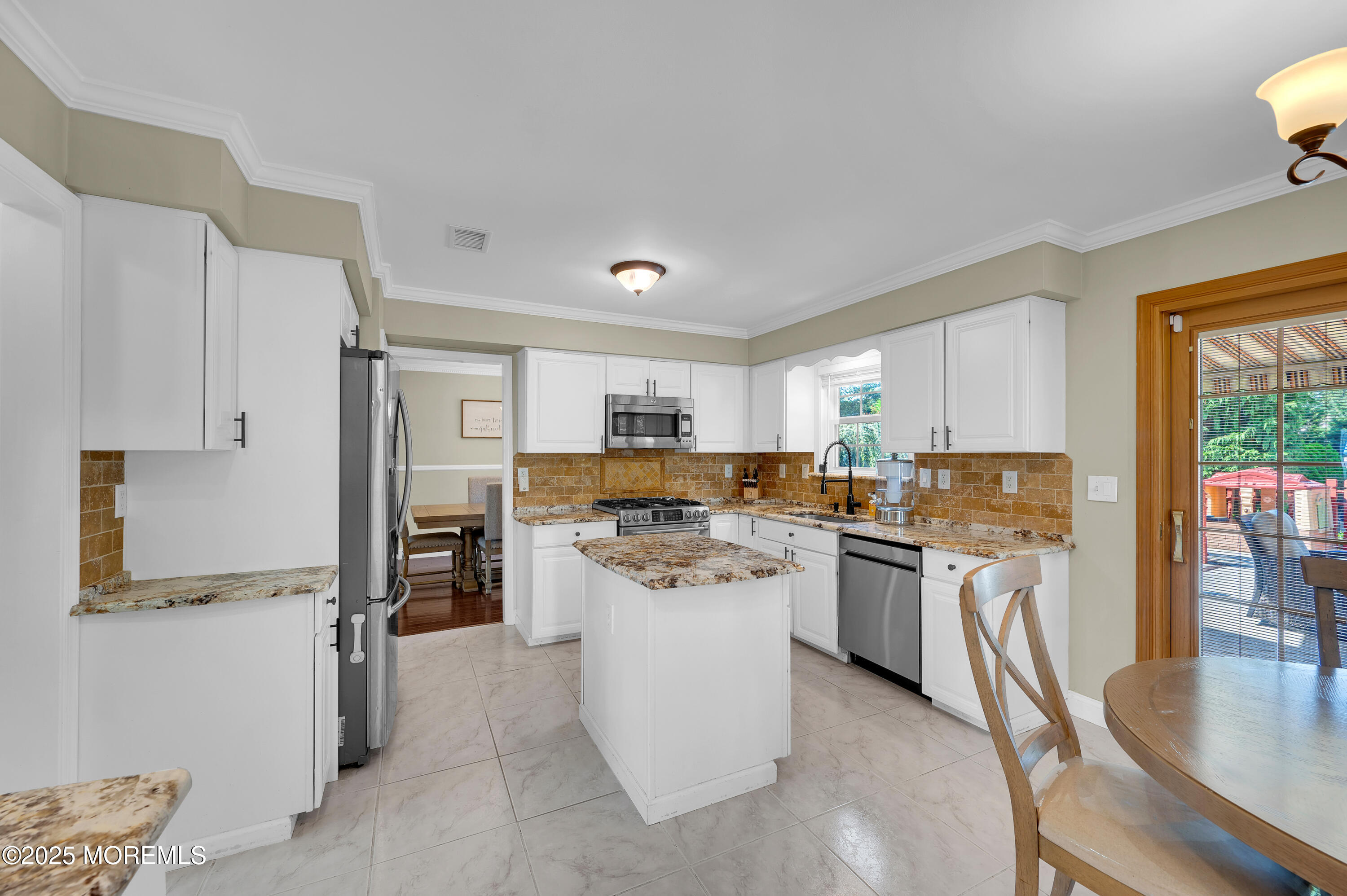 4 Diamond Lane Howell, NJ 07731 - Photo 12 of 63 a kitchen with a refrigerator stove top oven and sink