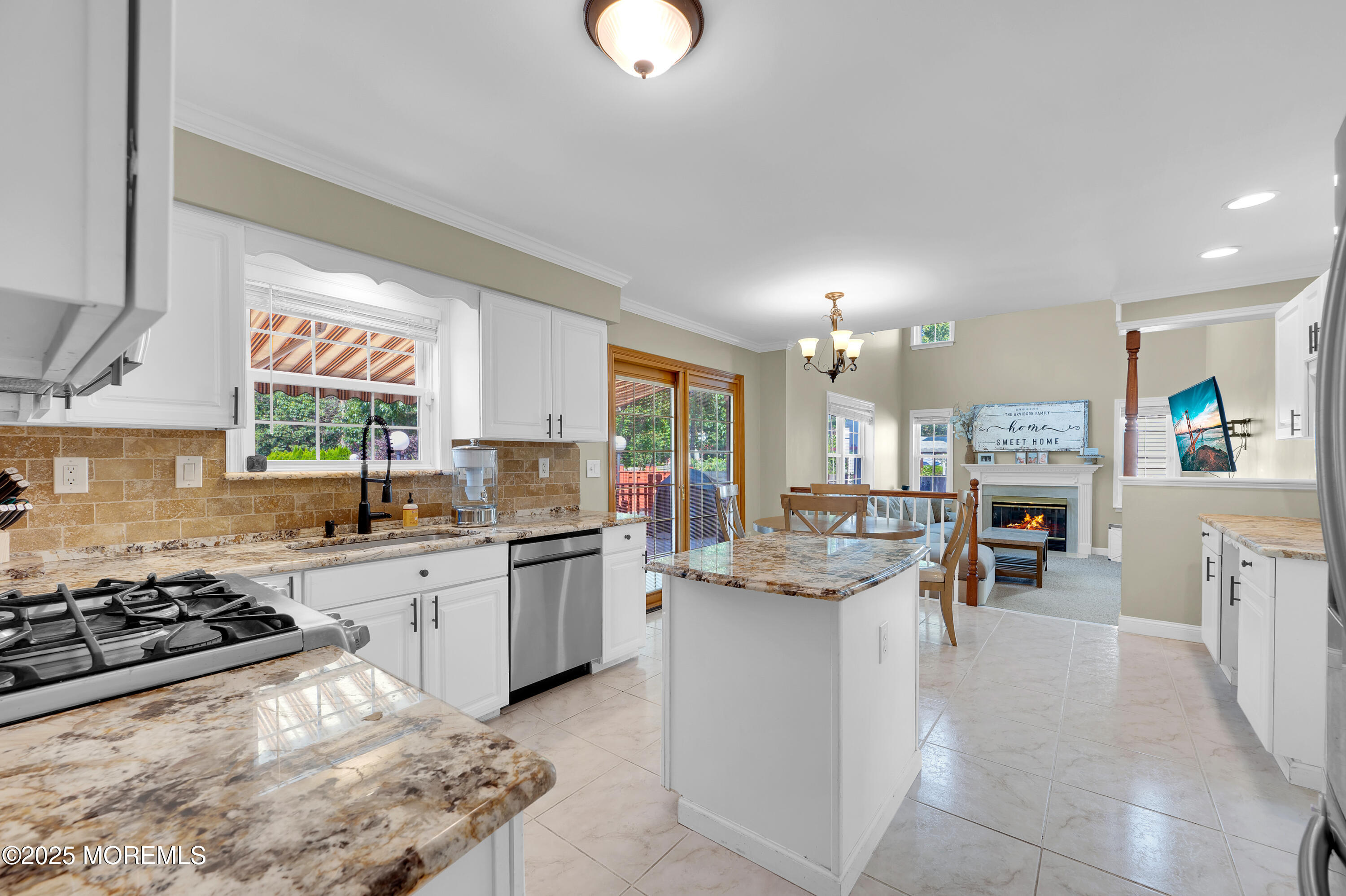 4 Diamond Lane Howell, NJ 07731 - Photo 16 of 63 a kitchen with stainless steel appliances granite countertop a stove oven and a refrigerator