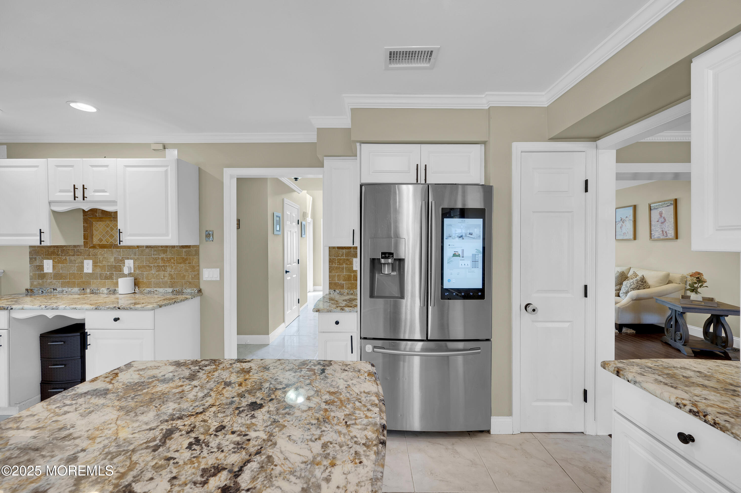 4 Diamond Lane Howell, NJ 07731 - Photo 17 of 63 a kitchen with stainless steel appliances granite countertop a refrigerator and a stove top oven