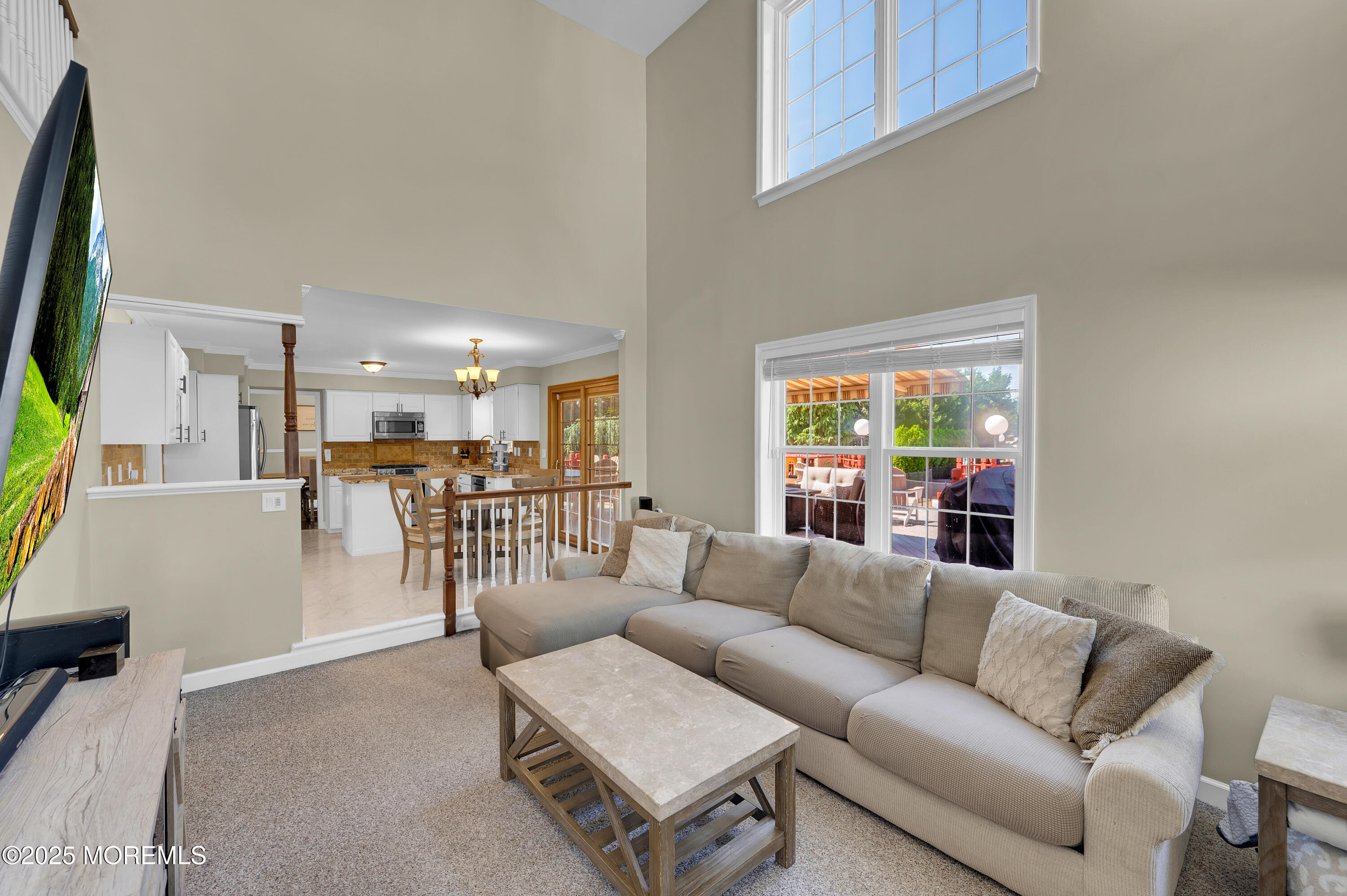 4 Diamond Lane Howell, NJ 07731 - Photo 26 of 63 a living room with furniture and a table