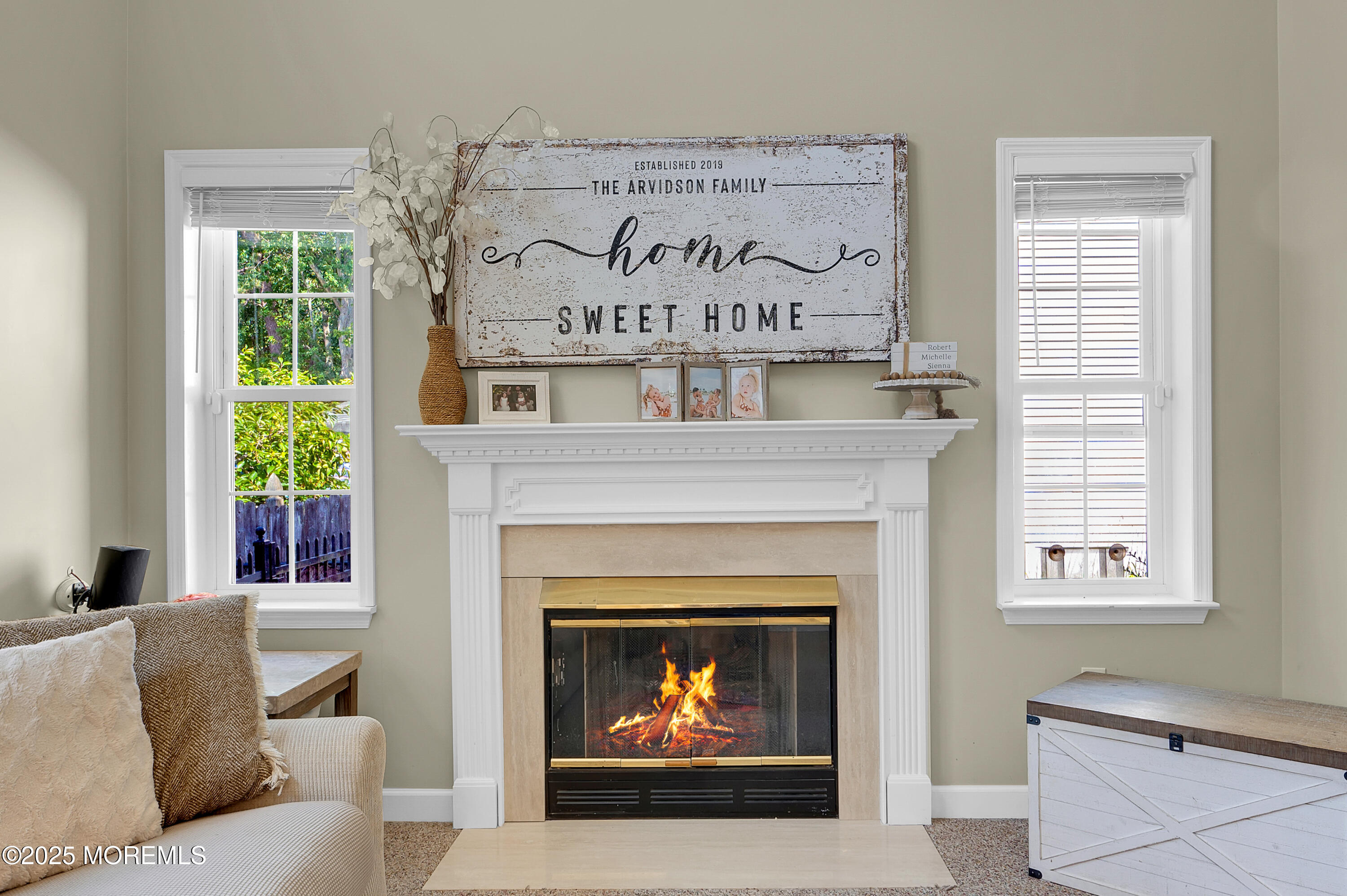 4 Diamond Lane Howell, NJ 07731 - Photo 28 of 63 a living room with a fireplace and a window