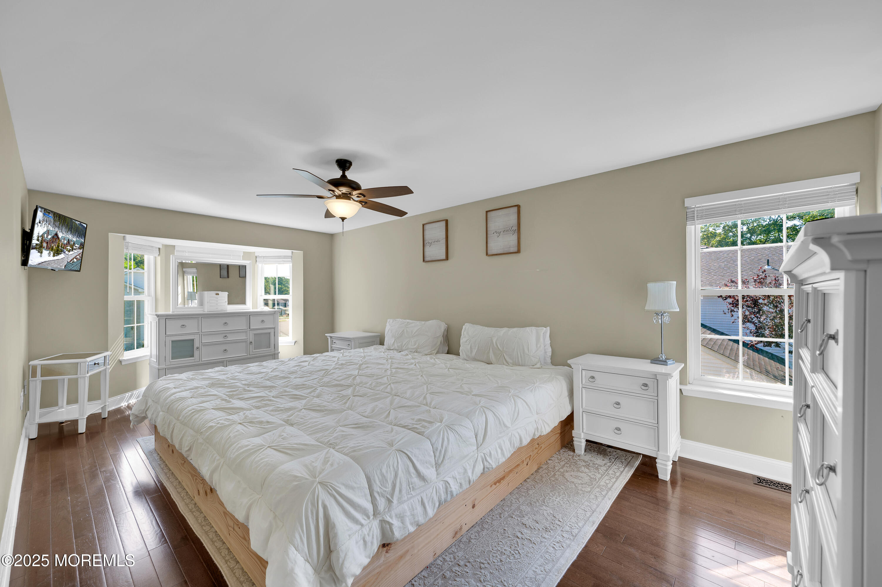 4 Diamond Lane Howell, NJ 07731 - Photo 31 of 63 a bedroom with a bed and wooden floor