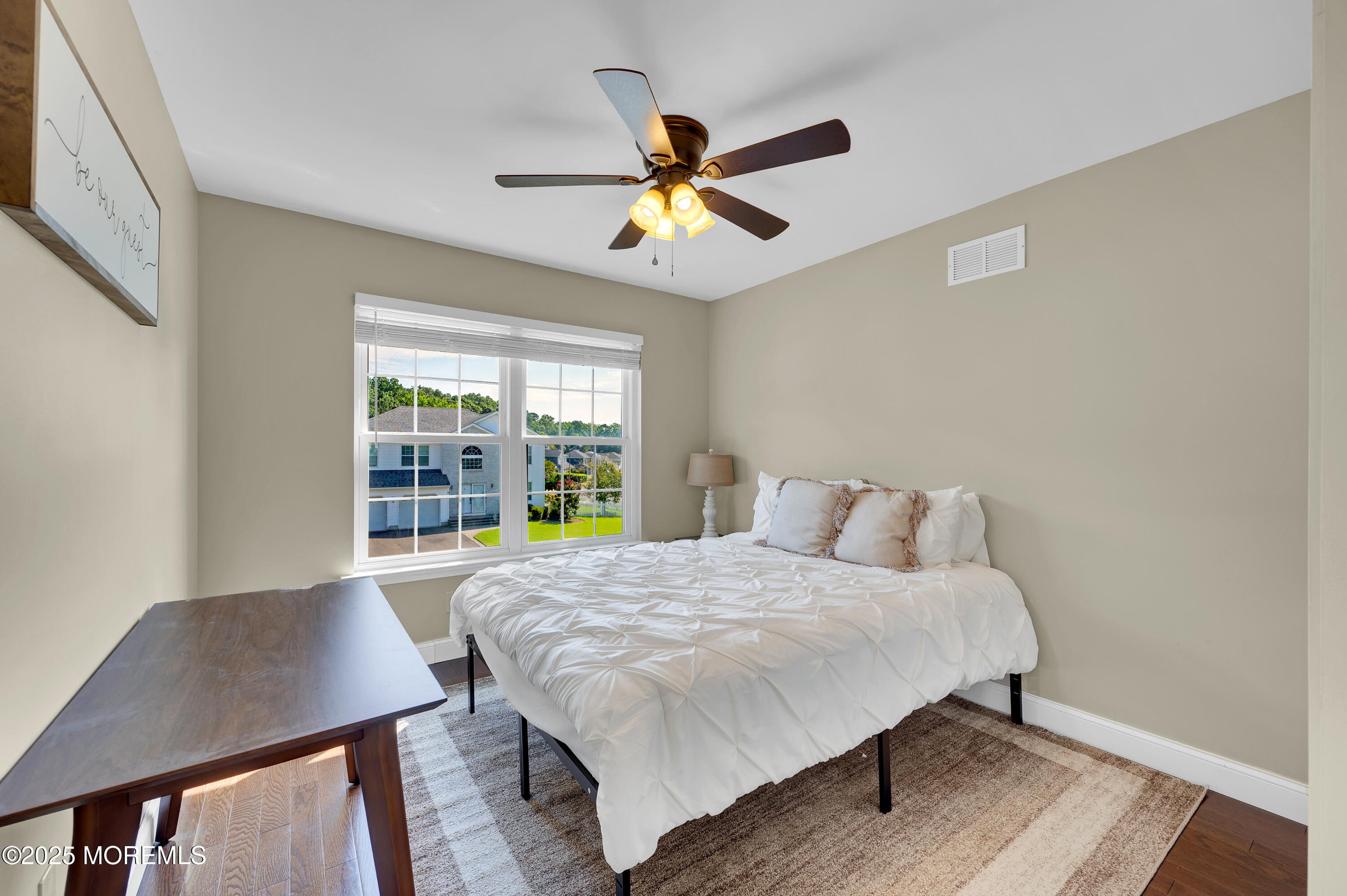 4 Diamond Lane Howell, NJ 07731 - Photo 35 of 63 a bedroom with a bed and a window