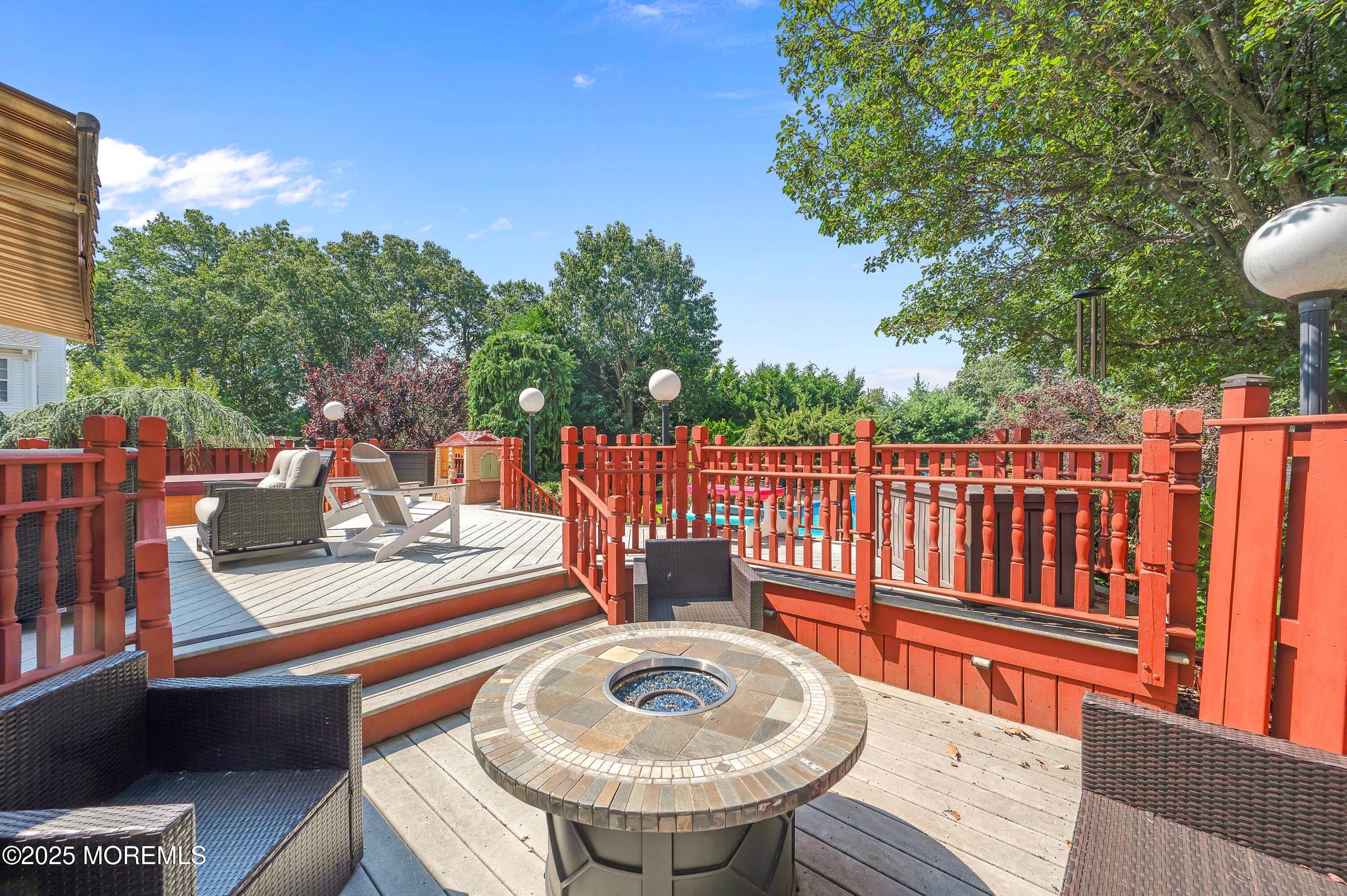 4 Diamond Lane Howell, NJ 07731 - Photo 52 of 63 a view of a table and chairs in the patio