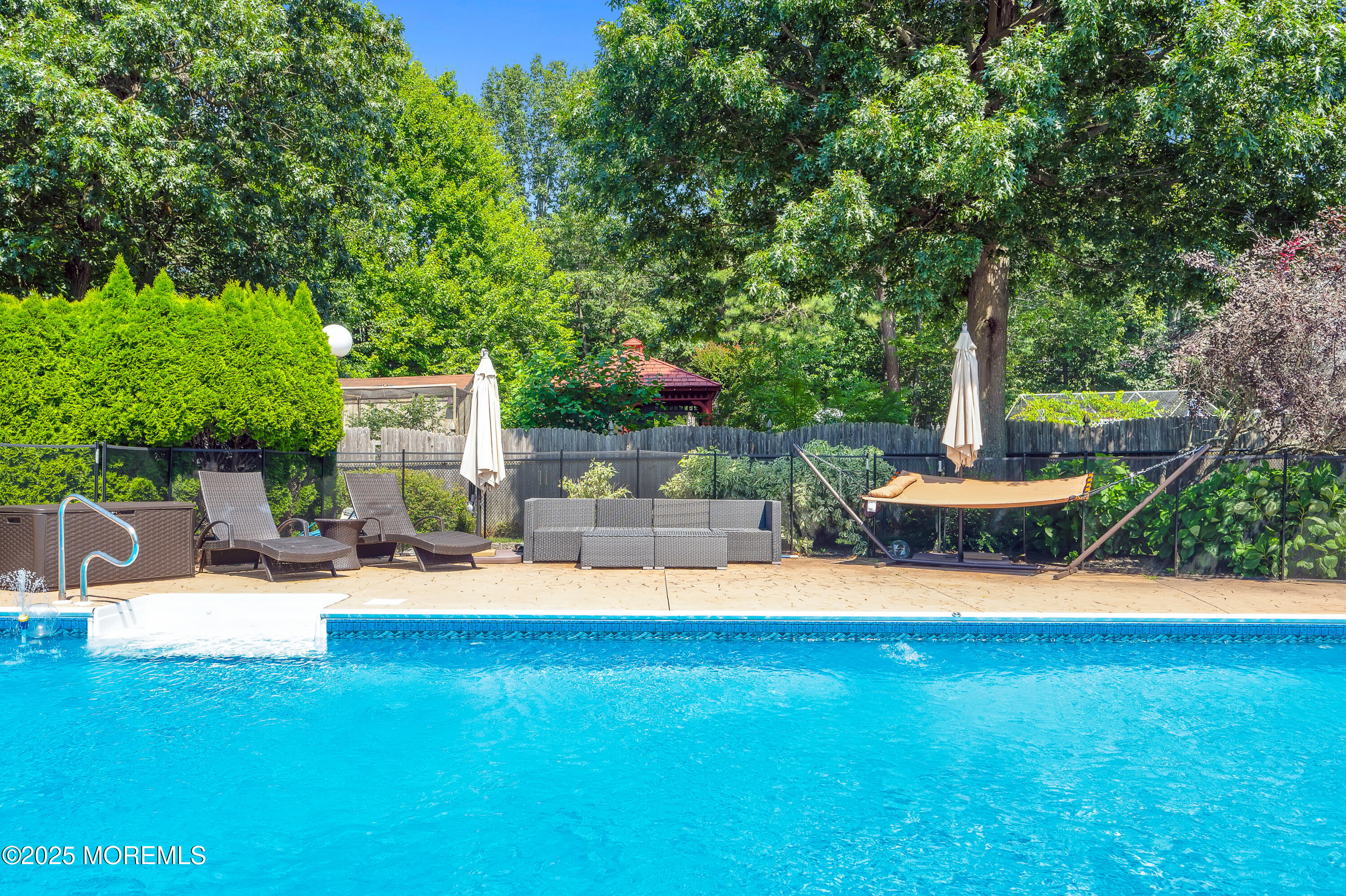 4 Diamond Lane Howell, NJ 07731 - Photo 53 of 63 a view of a house with swimming pool and sitting area