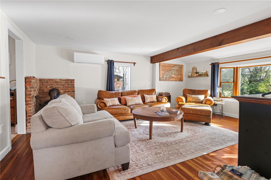 151 Ives Road Warwick, RI 02818 - Photo 11 of 50 Attractive wood beams in living room.