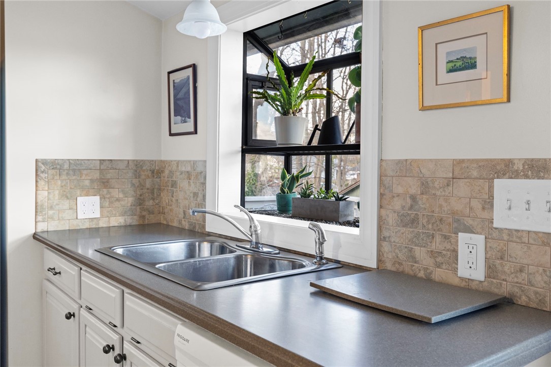 151 Ives Road Warwick, RI 02818 - Photo 22 of 50 The sink area is highlighted by a sweet garden window.