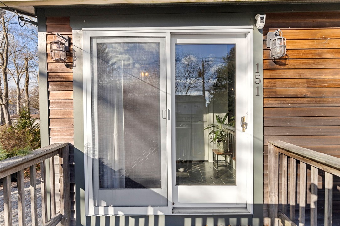 151 Ives Road Warwick, RI 02818 - Photo 6 of 50 Sliding doors lead to sun-filled foyer.