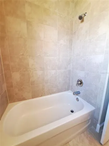 a bathroom with a bathtub