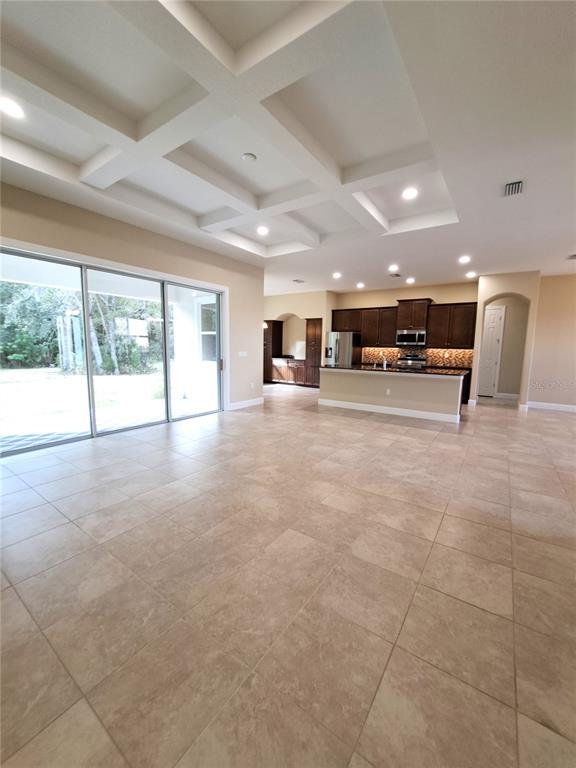 6 Parkview Circle Palm Coast, FL 32137 - Photo 2 of 32 a large hall with a large window