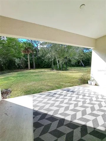 a view of a big room with a big yard