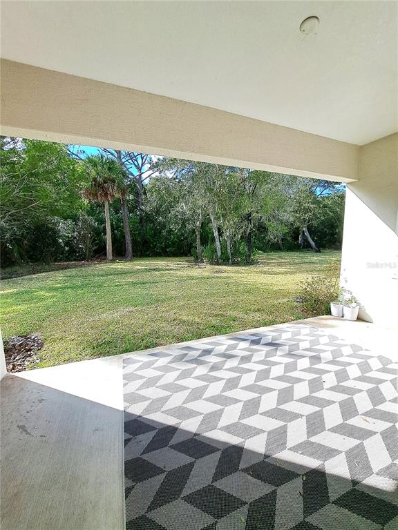 6 Parkview Circle Palm Coast, FL 32137 - Photo 32 of 32 a view of a big room with a big yard