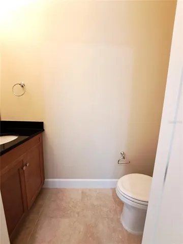 a bathroom with a toilet and a sink