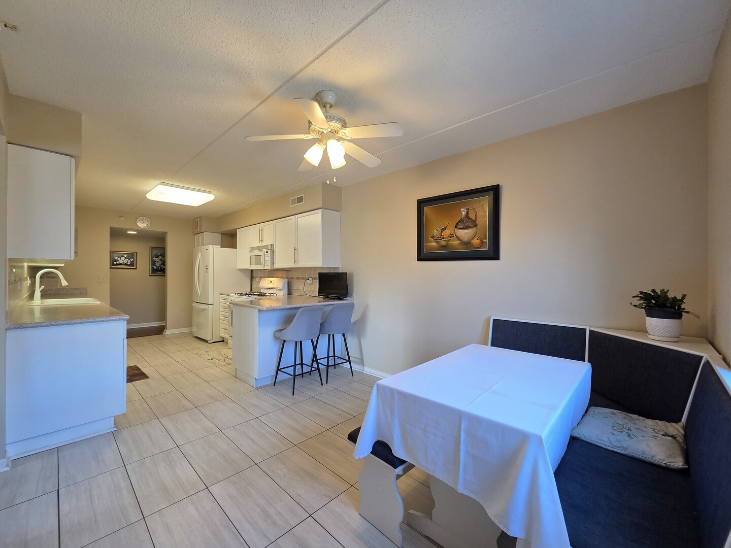 6815 North Milwaukee Avenue, Unit 210 Niles, IL 60714 - Photo 17 of 47 a view of a dining room with furniture
