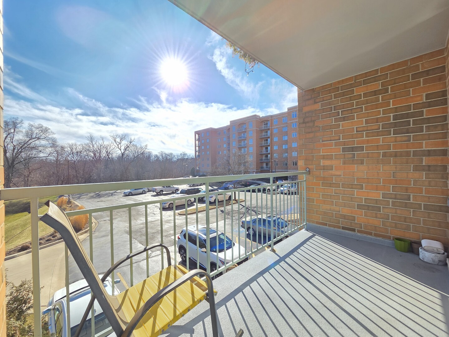 6815 North Milwaukee Avenue, Unit 210 Niles, IL 60714 - Photo 26 of 47 a view of a balcony with furniture