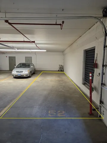 a view of room with gym equipment