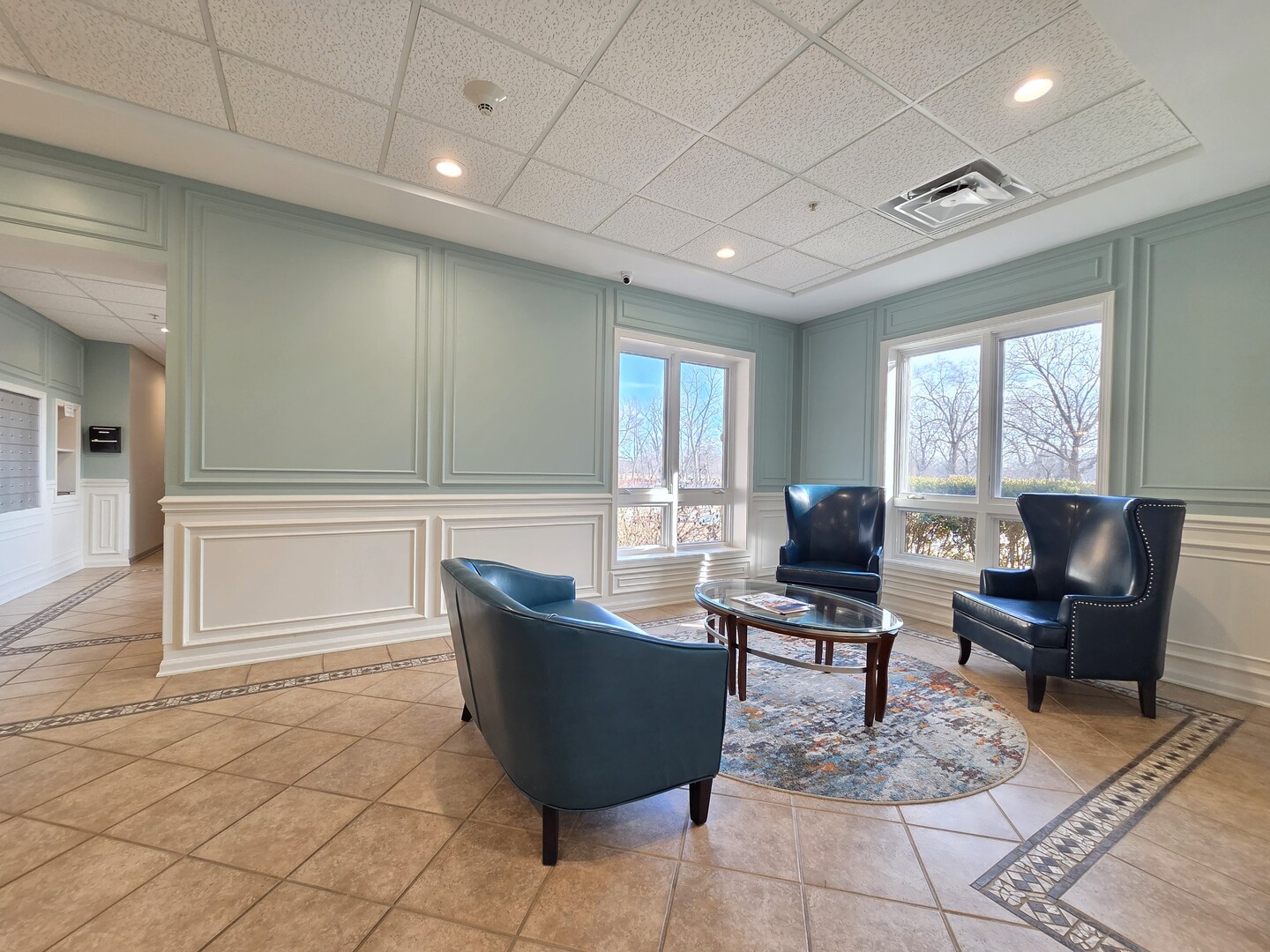 6815 North Milwaukee Avenue, Unit 210 Niles, IL 60714 - Photo 7 of 47 a view of a workspace with furniture