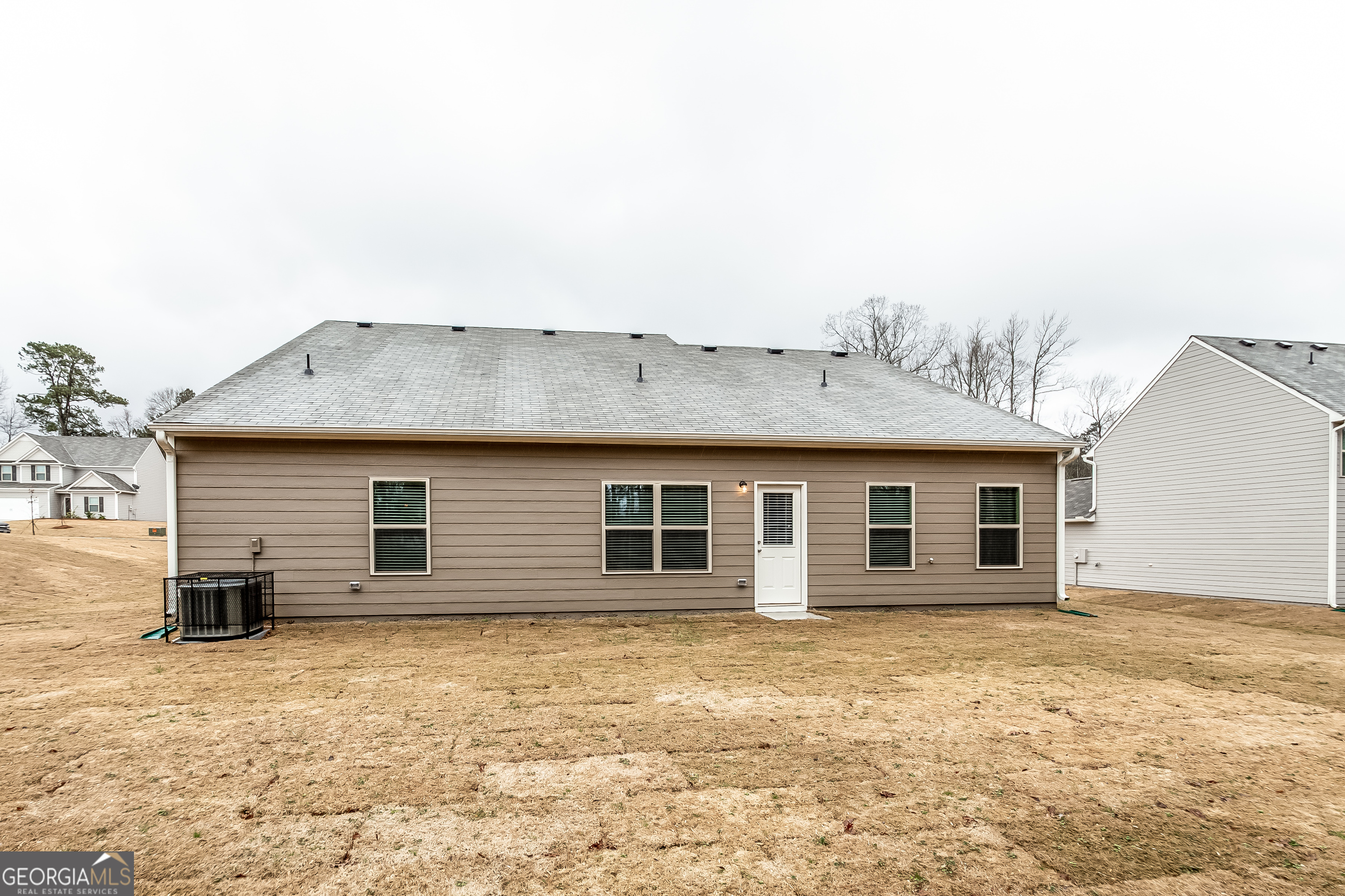 30 Olivia Way Covington, GA 30016 - Photo 15 of 15 a front view of a house with a yard