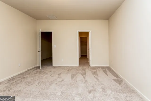 an empty room with closet