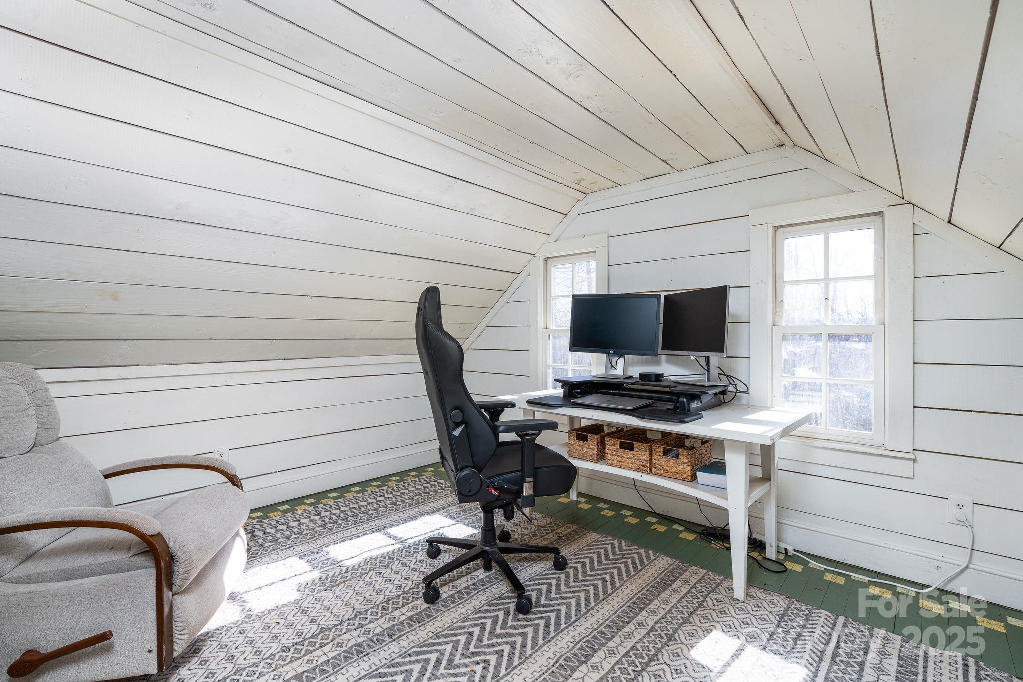 311 North Campbell Road Landrum, SC 29356 - Photo 30 of 48 a view of a workspace with furniture and a window