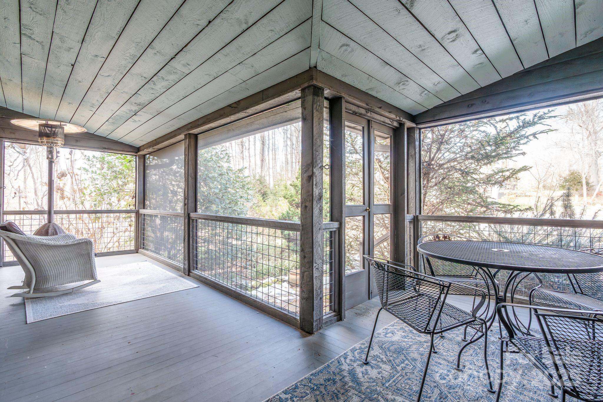 311 North Campbell Road Landrum, SC 29356 - Photo 33 of 48 a balcony with furniture and wooden floor