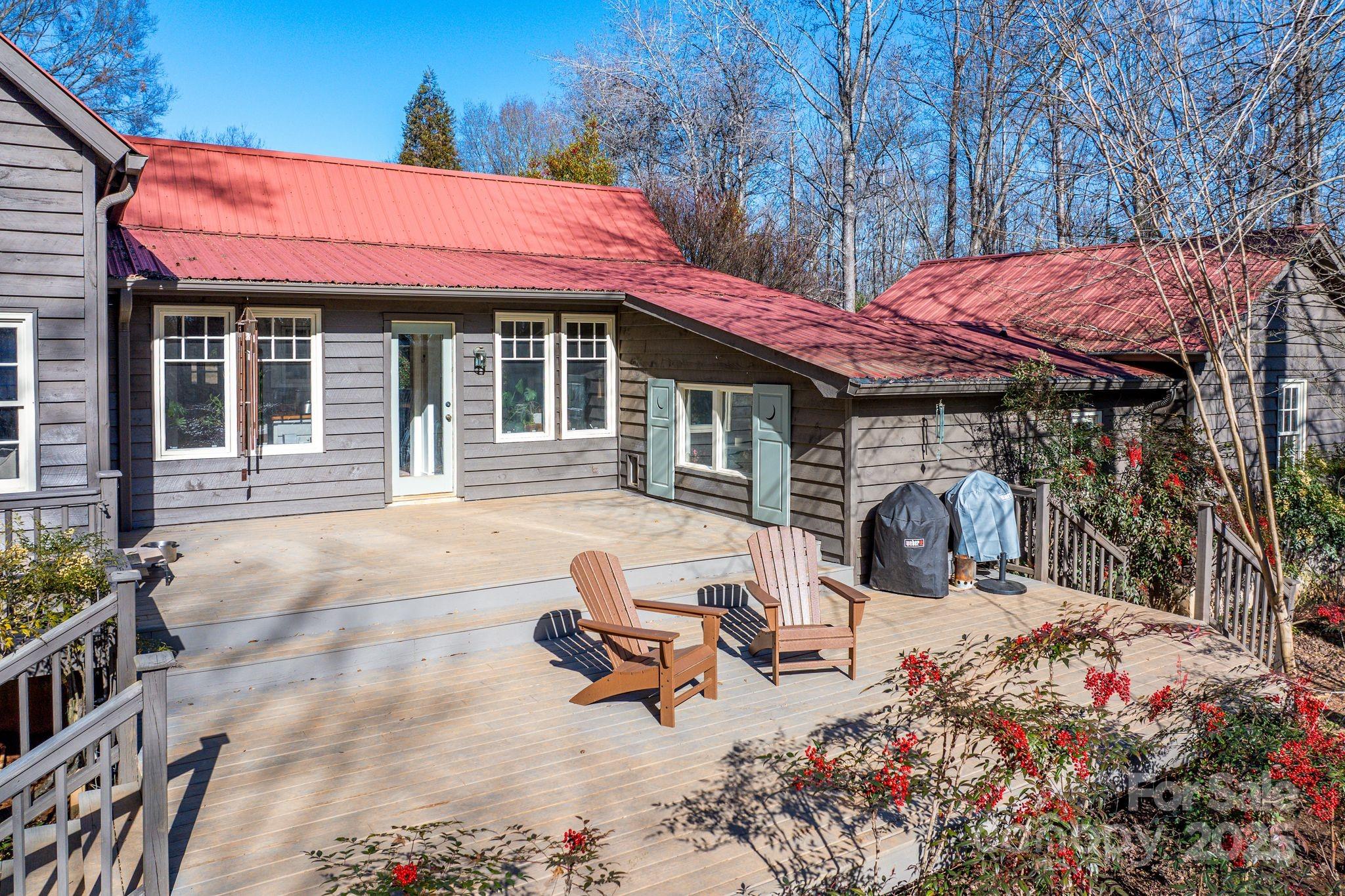 311 North Campbell Road Landrum, SC 29356 - Photo 37 of 48 a view of a house with yard and sitting area