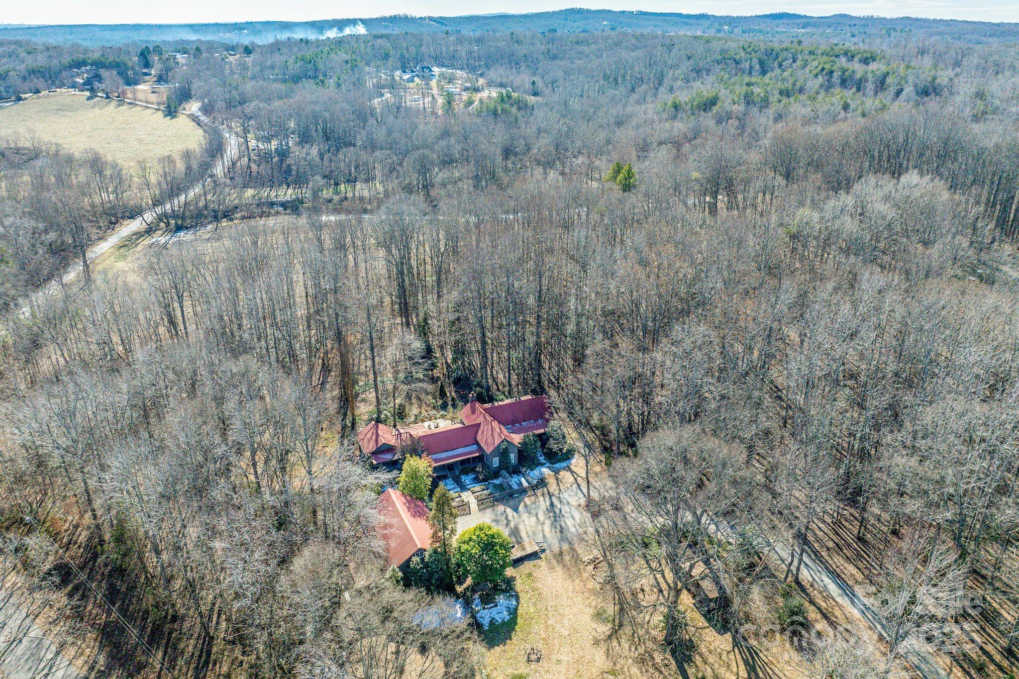 311 North Campbell Road Landrum, SC 29356 - Photo 8 of 48 an aerial view of a house with a yard