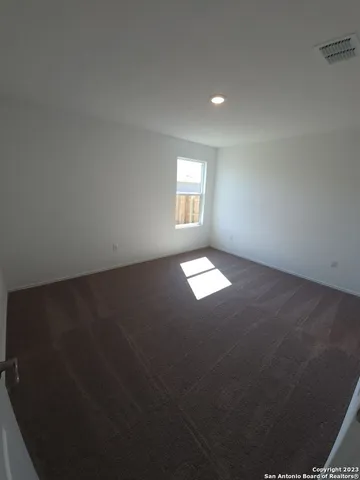 an empty room with a window