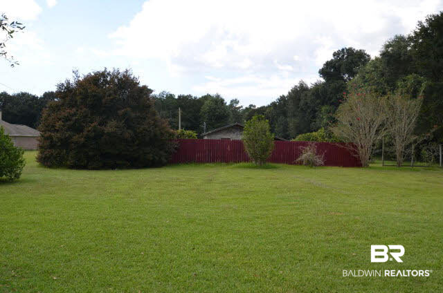 16533 Danne Road Fairhope, AL 36532 - Photo 34 of 41 This property is huge but there is a great area that is partially fenced from the rest of the yard for privacy or equipment storage.