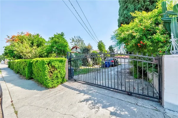 a view of a entrance gate of a house