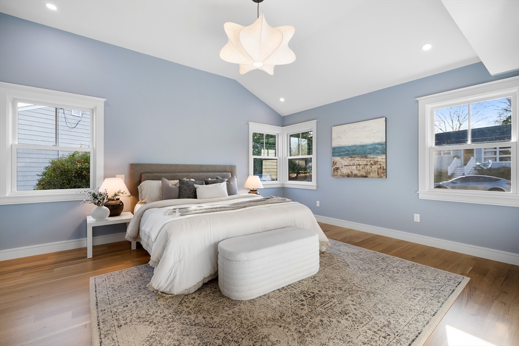 2 Howard Court Woburn, MA 01801 - Photo 17 of 37 a bedroom with a large bed and a window