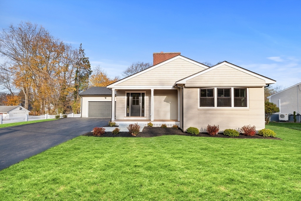 2 Howard Court Woburn, MA 01801 - Photo 37 of 37 a front view of a house with a yard and trees