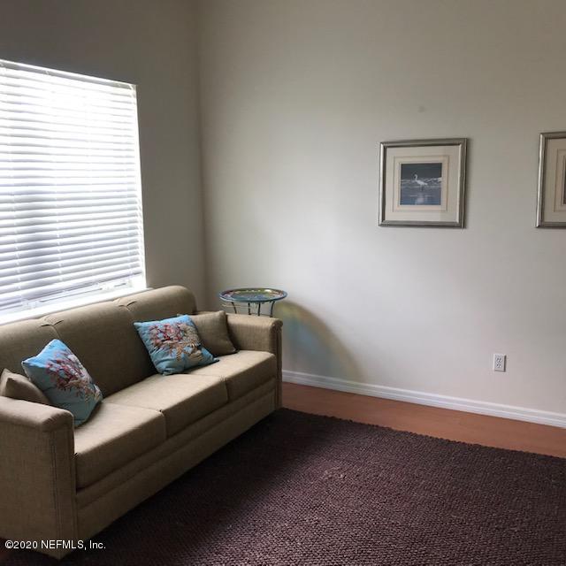 301 Twenty Second Street St. Augustine, FL 32084 - Photo 12 of 25 a living room with furniture and a window