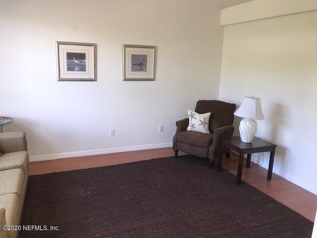 301 Twenty Second Street St. Augustine, FL 32084 - Photo 13 of 25 a room with furniture and a wooden floor